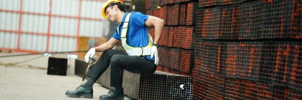 worker with accident at factory, Worker with injury from machine working